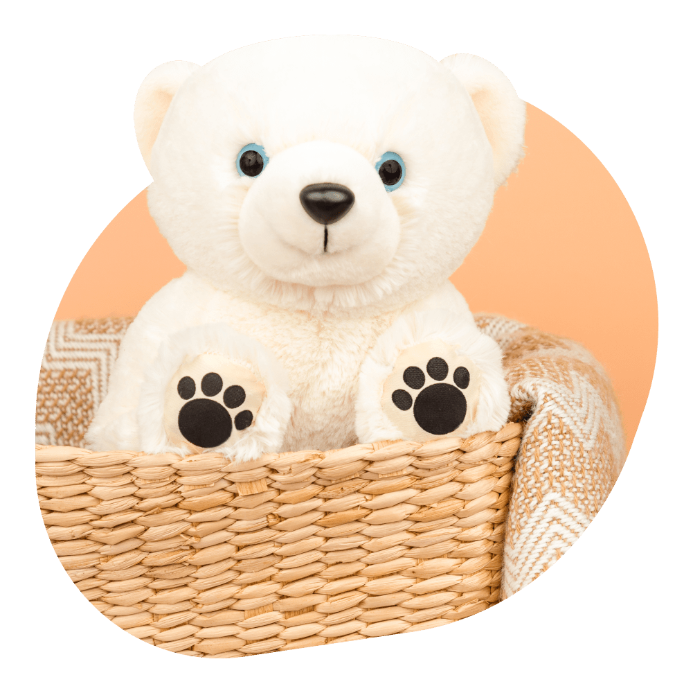 Polar bear plushie angled view.